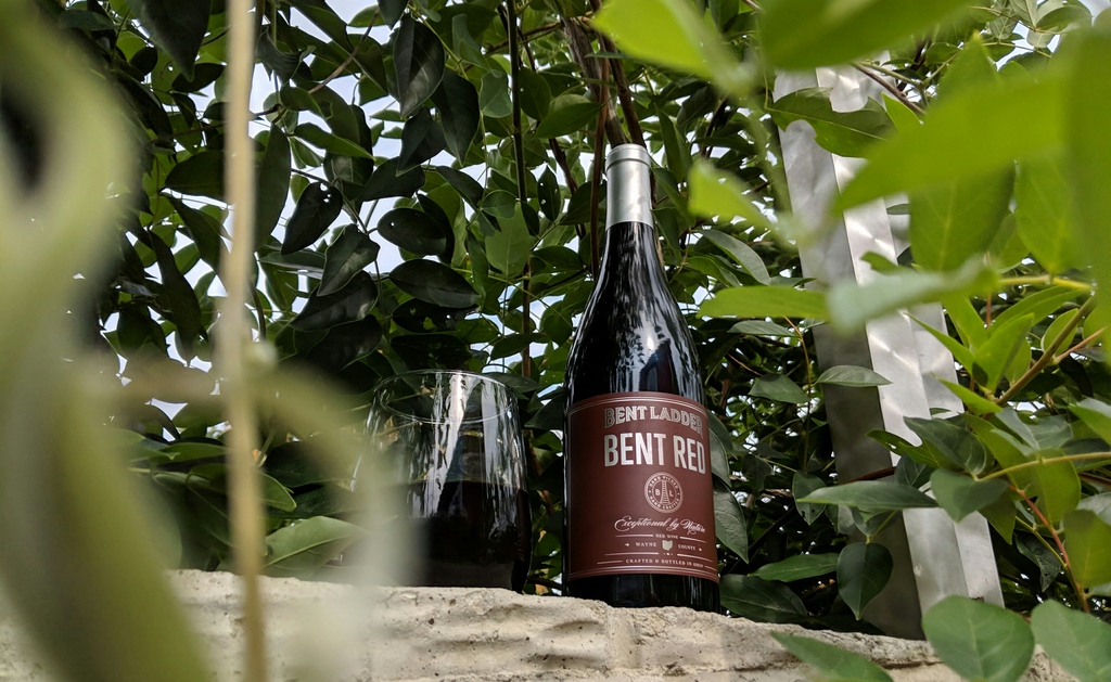 A bottle of Bent Red outside